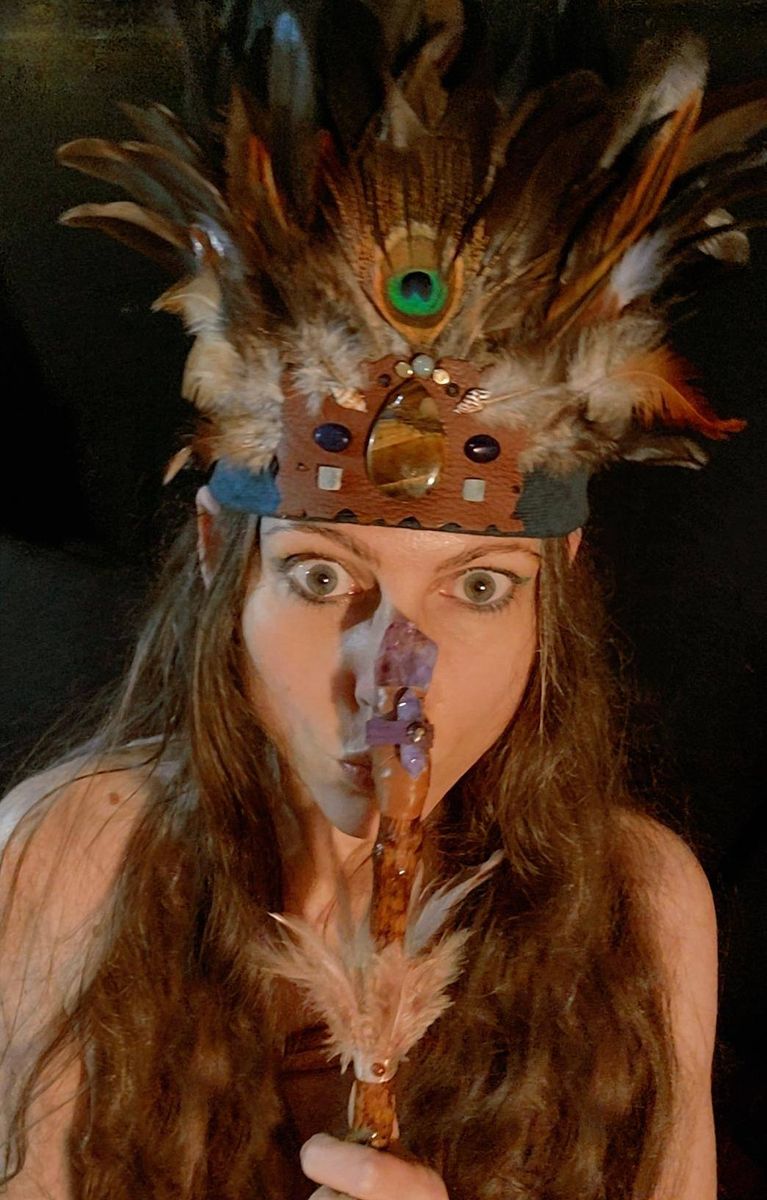 Michela with sacred wand and headdress
