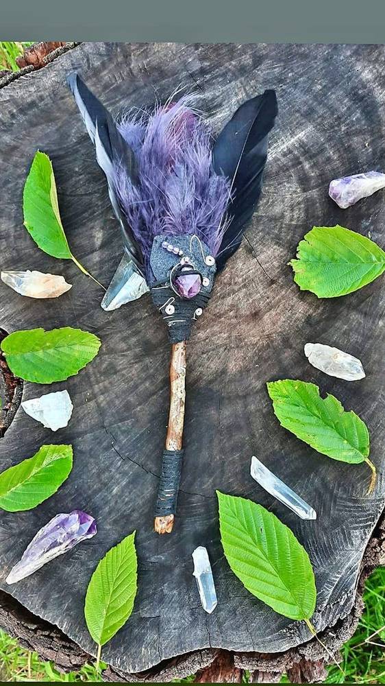 Dark purple wand with crystals