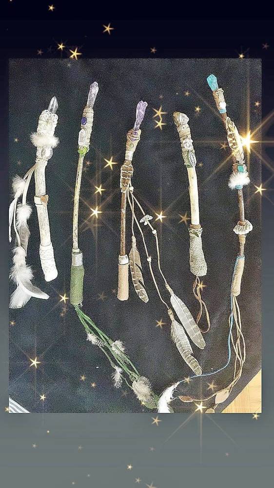Four wands with stars