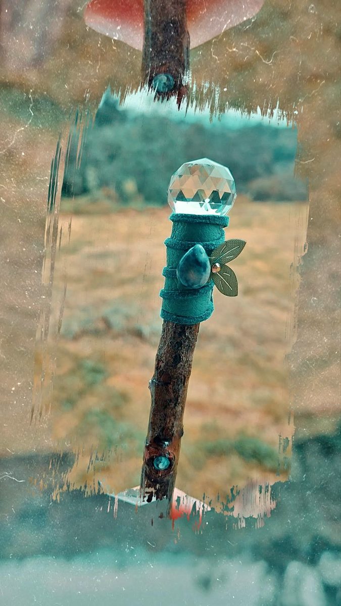 Teal crystal ball wand
